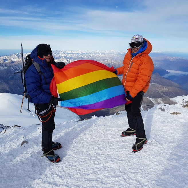 Pink Summits - rainbow flag on Elbrus